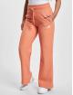 New Balance Joggingbyxor Athletics färgad
