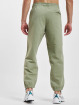 New Balance Joggingbyxor Athletics Nature State New oliv