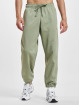 New Balance Joggingbyxor Athletics Nature State New oliv