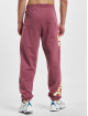 New Balance Joggingbyxor Athletics Warped Classics New röd