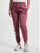 New Balance Joggingbyxor Athletics Warped Classics New röd