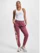 New Balance Joggingbyxor Athletics Warped Classics New röd