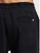 New Balance Joggingbyxor Essentials svart