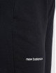 New Balance Joggingbyxor Essentials svart