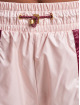 New Balance Pantalon chino Athletics Higher Learning New rose