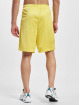 New Balance Pantalón cortos Essentials Mesh amarillo