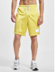 New Balance Pantalón cortos Essentials Mesh amarillo