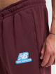 New Balance Pantalón deportivo Essentials Stacked Rubber Pack rojo