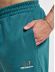 New Balance Pantalón deportivo Uni-Ssentials French Terry New turquesa
