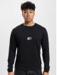 New Balance Pitkähihaiset paidat Essentials Seasonal musta