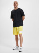 New Balance shorts Essentials Mesh geel
