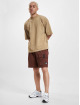 New Balance Shortsit At Rich Oak ruskea