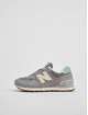 New Balance Sneaker 574 grau