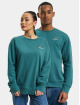 New Balance Sweat & Pull Uni-Ssentials French Terry turquoise