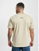 New Balance T-paidat Athletics Jacob Rochester beige