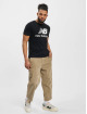 New Balance T-Shirt Essential Stacked Logo schwarz