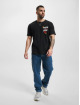 New Balance T-Shirt Essentials Novelty 574 Graphic schwarz