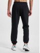 New Balance Verryttelyhousut Essentials musta
