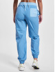 New Balance Verryttelyhousut Athletics Woven sininen