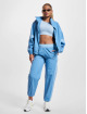 New Balance Verryttelyhousut Athletics Woven sininen