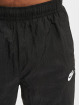 Nike Anzug Club Woven Basic schwarz