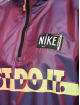 Nike Chaqueta de entretiempo W NSW WVN PO JKT Wash púrpura