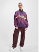 Nike Chaqueta de entretiempo W NSW WVN PO JKT Wash púrpura