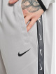 Nike joggingbroek Sportswear Repeat grijs