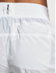 Nike Pantalón deportivo W Woven blanco
