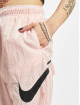 Nike Pantalón deportivo Essentials Wvn Mr Hbr rosa