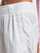 Nike Pantalone ginnico W Woven bianco
