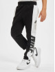 Nike Spodnie do joggingu Amplify czarny
