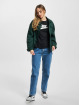 Nike T-paidat Essential Icon Future musta