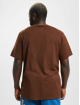 Nike T-paidat Sportswear Club ruskea