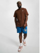 Nike T-paidat Sportswear Club ruskea