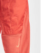 Nike tepláky GX Sweat oranžová