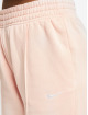 Nike tepláky Essentials Clctn Flc Mr ružová