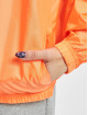 Nike Übergangsjacke W NSW WVN PO JKT Wash orange