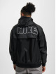 Nike Välikausitakit Windbreaker musta