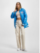 Tommy Jeans Bomberjacke Shiny Oversized Quilt blau
