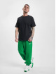 Tommy Jeans Jogginghose Relaxed Winter Signature grün