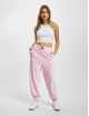 Tommy Jeans Jogginghose Velour Badge rosa