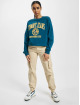 Tommy Jeans Pullover Crop College Logo türkis