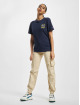 Tommy Jeans t-shirt Relaxed Running Club blauw