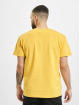 UNFAIR ATHLETICS T-Shirt Dmwu Patch jaune