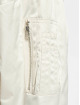 Urban Classics Bomberová bunda Ladies Short Oversized Satin béžová