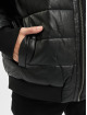 Urban Classics Kurtki zimowe Hooded Faux Leather czarny