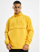Urban Classics Prechodné vetrovky Hidden Hood Pull Over žltá