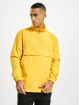 Urban Classics Prechodné vetrovky Hidden Hood Pull Over žltá