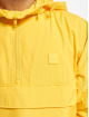 Urban Classics Prechodné vetrovky Hidden Hood Pull Over žltá